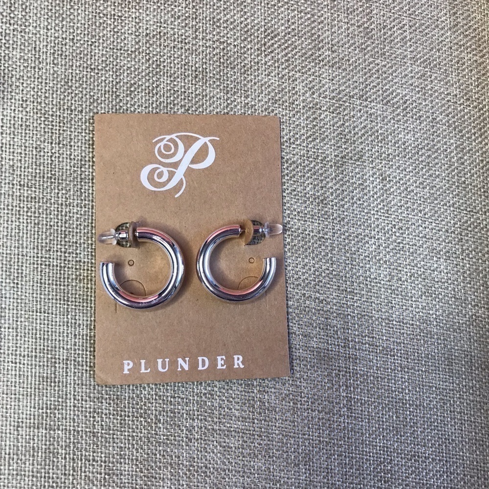 Plunder silver hoop earrings.